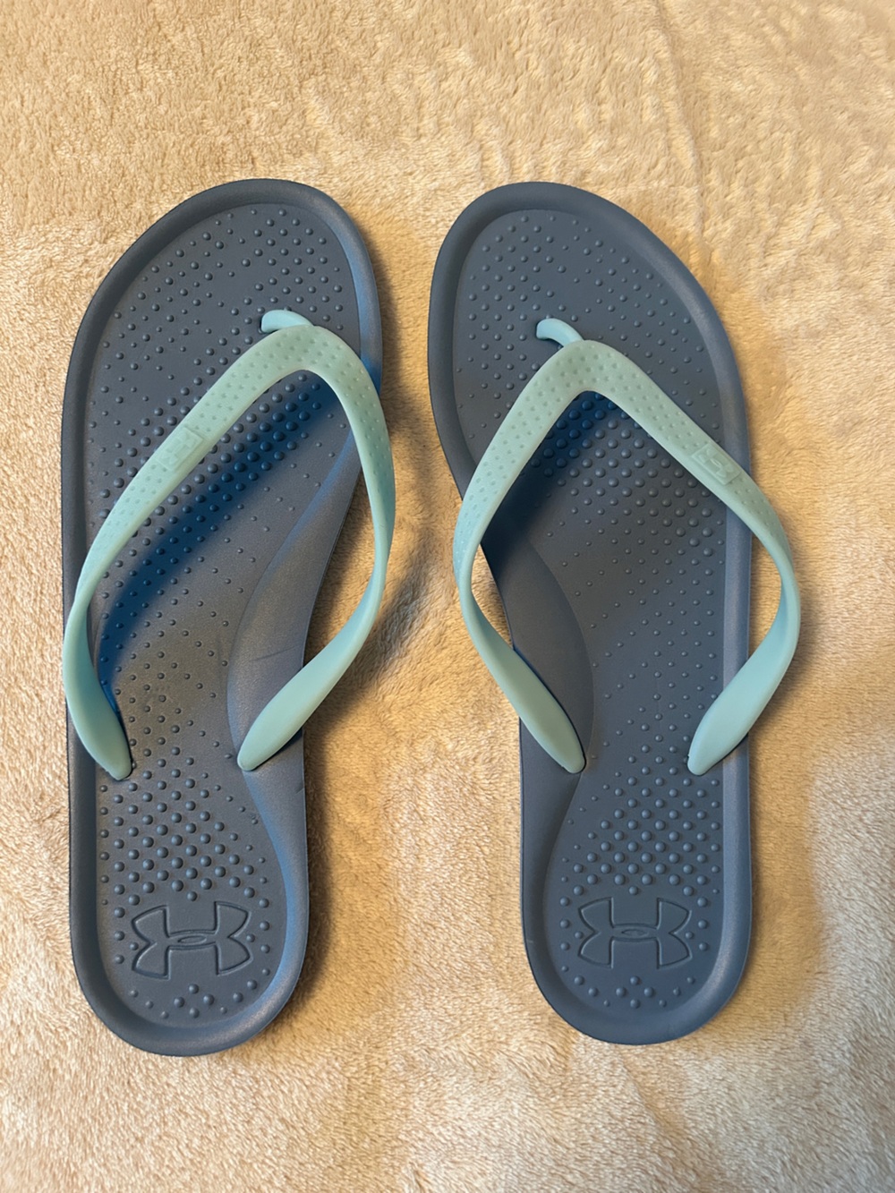 Under Armour light blue flip flop sandals